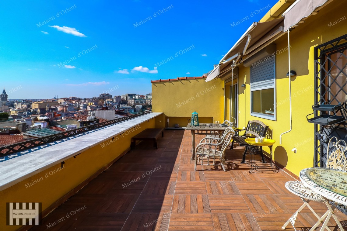 1+1 Flat with View and Private Terrace for Sale in Cihangir